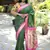 green woven paithani silk blend saree with blouse