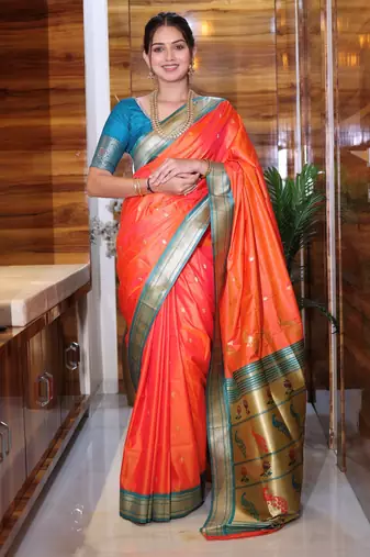 orange woven paithani silk blend saree with blouse
