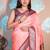 peach woven banarasi silk blend saree with blouse
