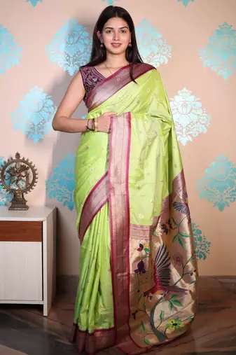 green woven banarasi silk blend saree with blouse