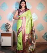 green woven banarasi silk blend saree with blouse