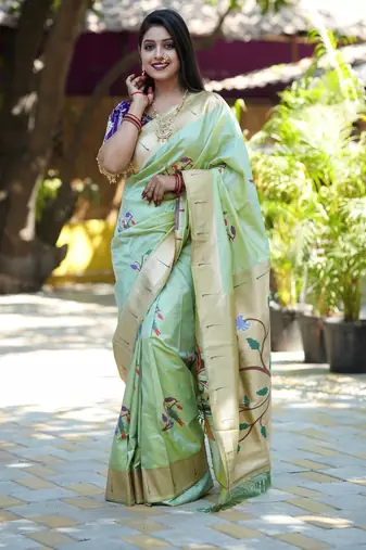 green woven paithani silk blend saree with blouse