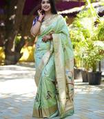 green woven paithani silk blend saree with blouse