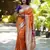 orange woven paithani silk blend saree with blouse