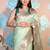 light green woven banarasi silk blend saree with blouse