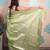 light green woven banarasi silk blend saree with blouse