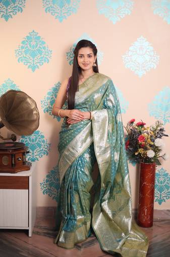 turquoise woven banarasi silk blend saree with blouse