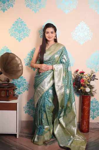turquoise woven banarasi silk blend saree with blouse