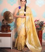 yellow woven banarasi silk blend saree with blouse