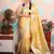 yellow woven banarasi silk blend saree with blouse