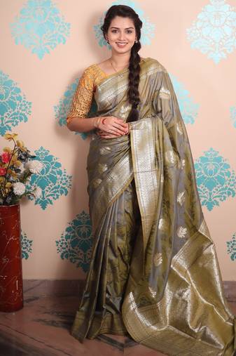 beige woven banarasi silk blend saree with blouse