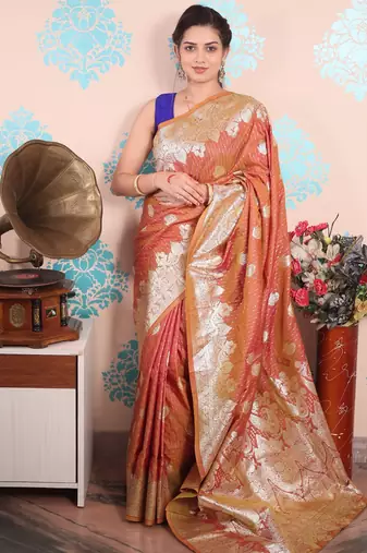 rust woven banarasi silk blend saree with blouse