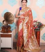 rust woven banarasi silk blend saree with blouse