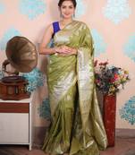 green woven banarasi silk blend saree with blouse