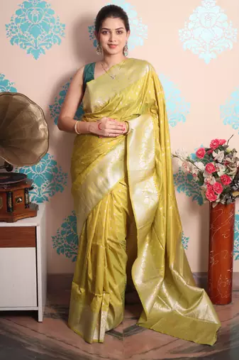 lime woven banarasi silk blend saree with blouse