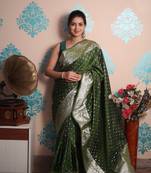 green woven banarasi silk blend saree with blouse