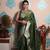 green woven banarasi silk blend saree with blouse