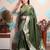 green woven banarasi silk blend saree with blouse