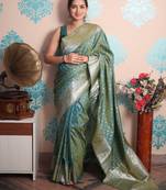 turquoise woven banarasi silk blend saree with blouse