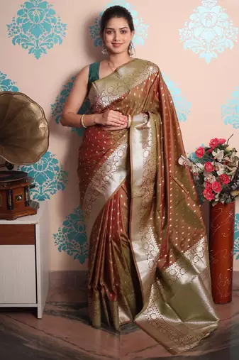 rust woven banarasi silk blend saree with blouse