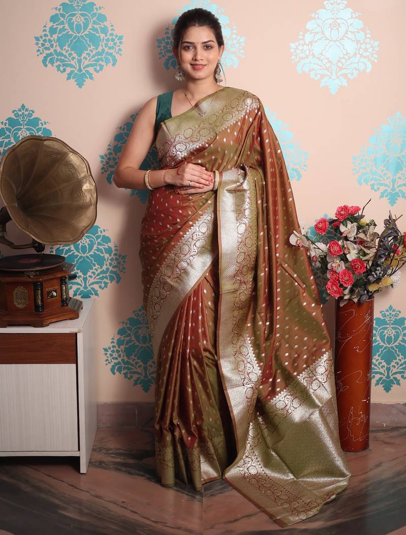 rust woven banarasi silk blend saree with blouse