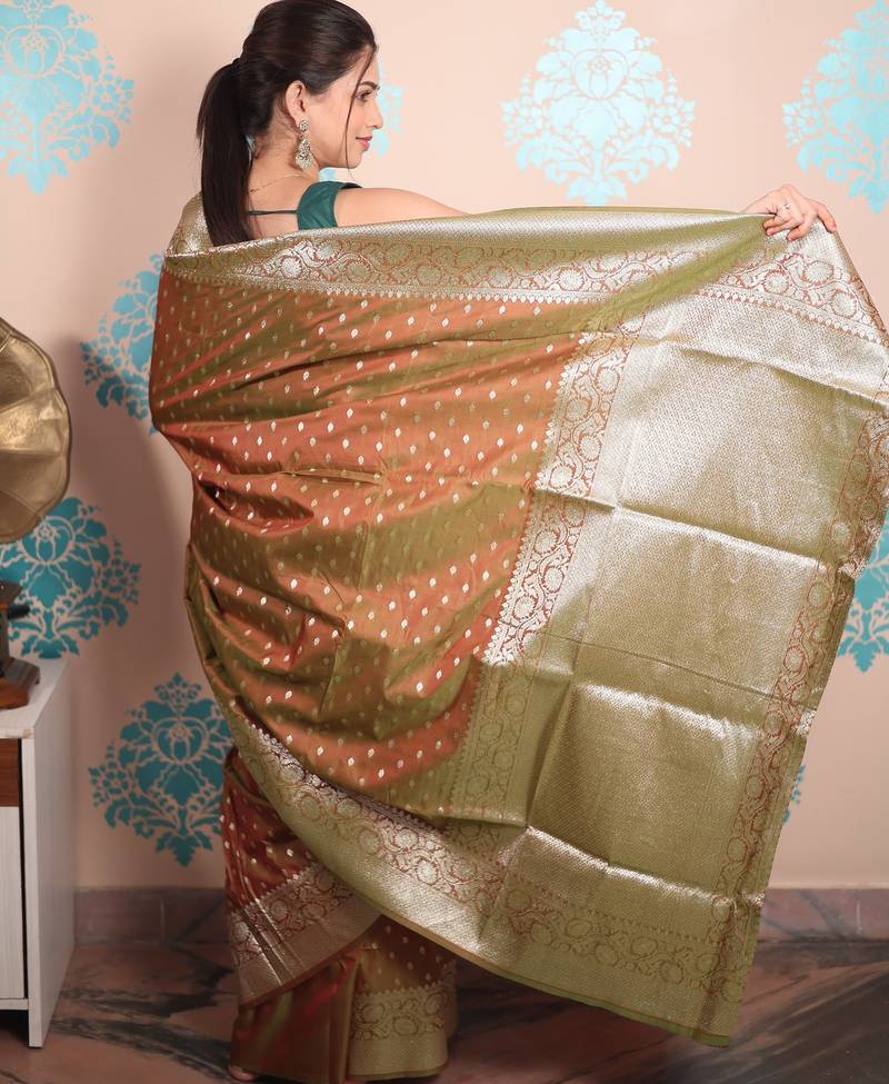 rust woven banarasi silk blend saree with blouse