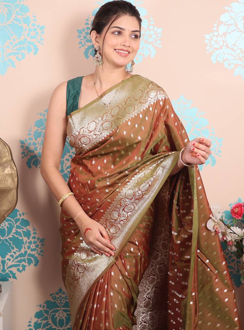 rust woven banarasi silk blend saree with blouse