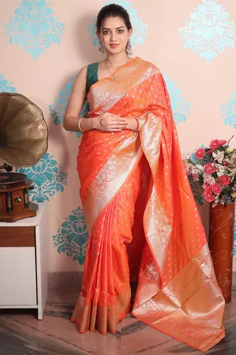 peach woven banarasi silk blend saree with blouse