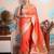 peach woven banarasi silk blend saree with blouse