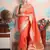 peach woven banarasi silk blend saree with blouse