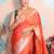 peach woven banarasi silk blend saree with blouse