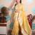 yellow woven banarasi silk blend saree with blouse
