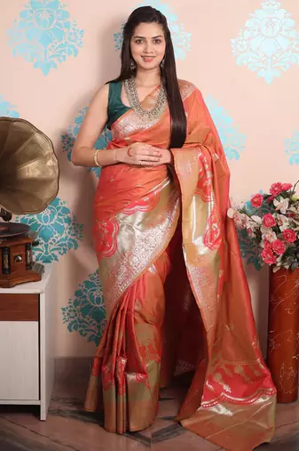 peach woven banarasi silk blend saree with blouse