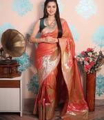 peach woven banarasi silk blend saree with blouse