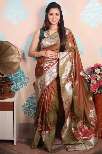 brown woven banarasi silk blend saree with blouse
