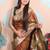 brown woven banarasi silk blend saree with blouse
