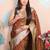 brown woven banarasi silk blend saree with blouse