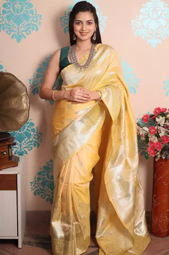 yellow woven banarasi silk blend saree with blouse