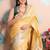 yellow woven banarasi silk blend saree with blouse