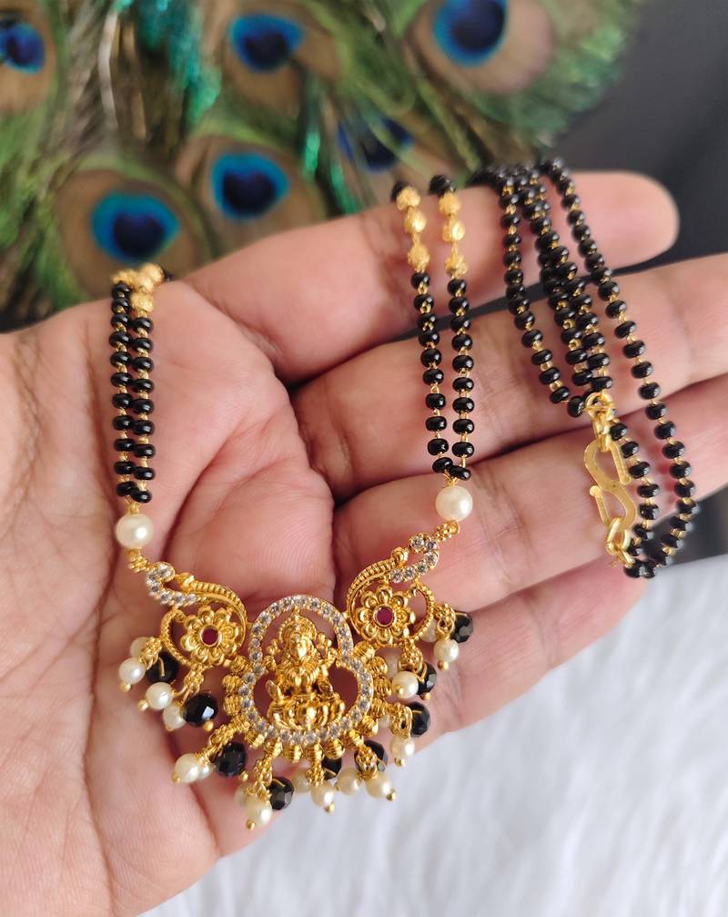 Gold plated temple black beads necklace