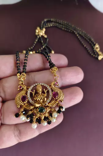 Gold plated temple peacock black beads necklace