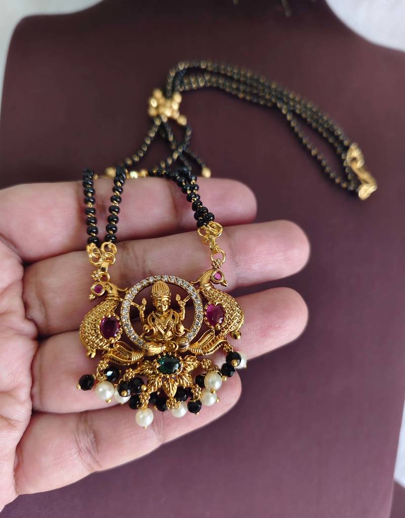 Gold plated temple peacock black beads necklace