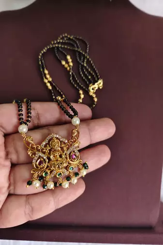 Gold plated temple lakshmi black beads necklace