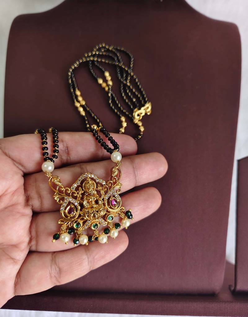 Gold plated temple lakshmi black beads necklace