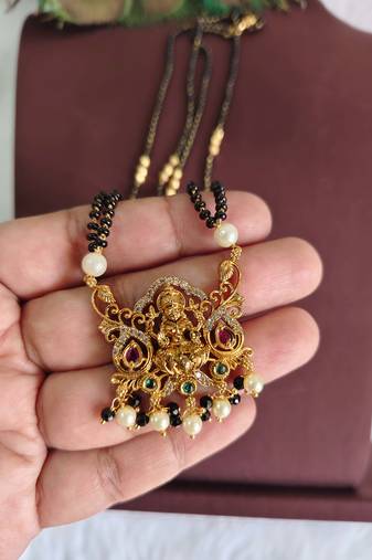 Gold plated temple lakshmi black beads necklace