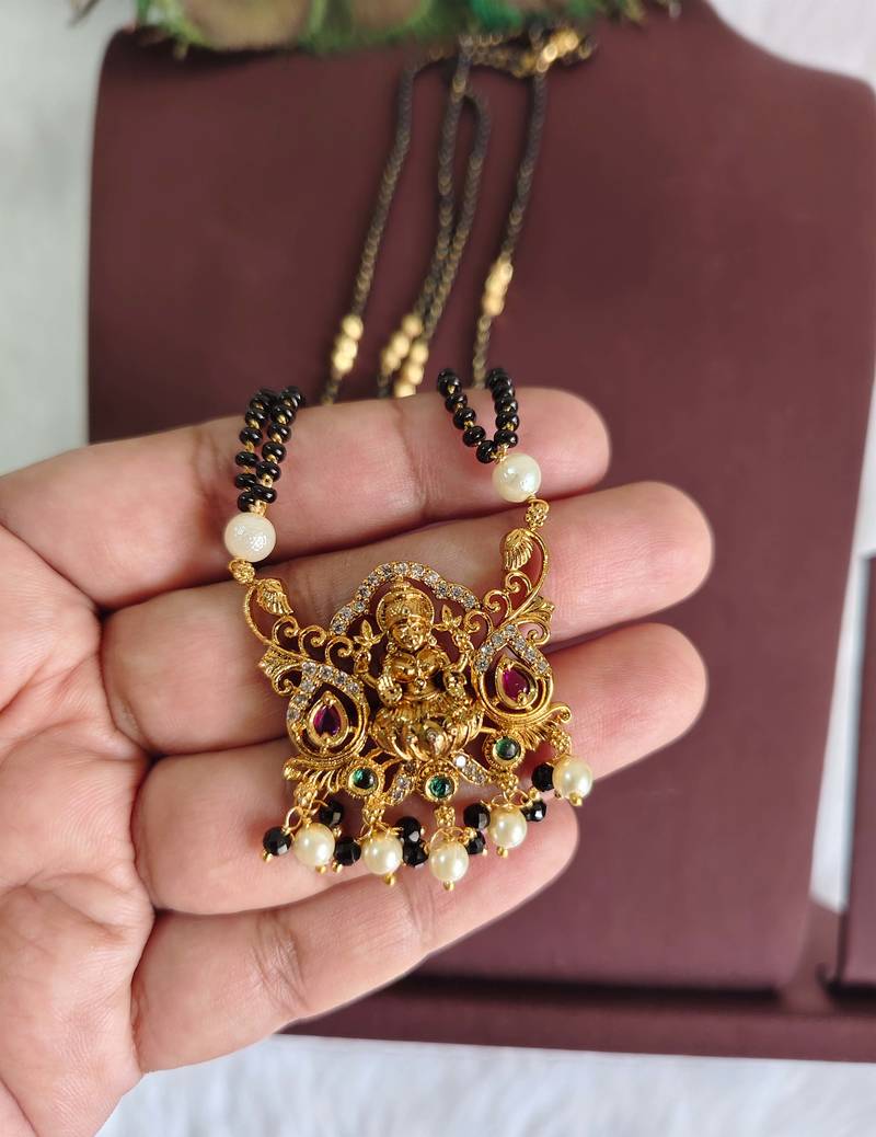 Gold plated temple lakshmi black beads necklace