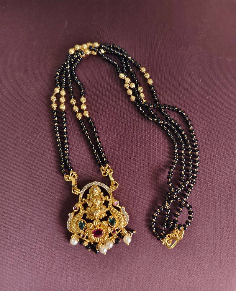 Gold plated peacock temple lakshmi black beads necklace