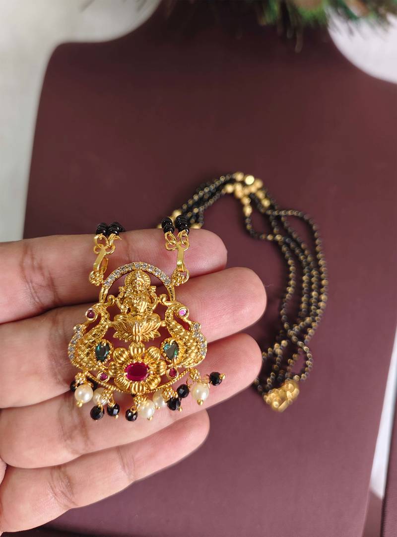 Gold plated peacock temple lakshmi black beads necklace