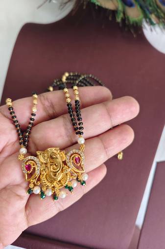Gold plated temple ganesha black beads necklace
