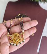 Gold plated temple ganesha black beads necklace